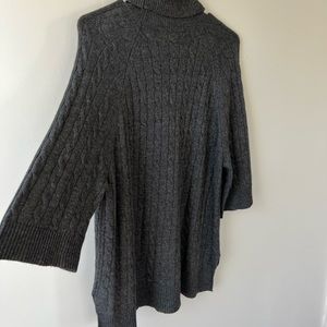Cable knit turtleneck wool sweater